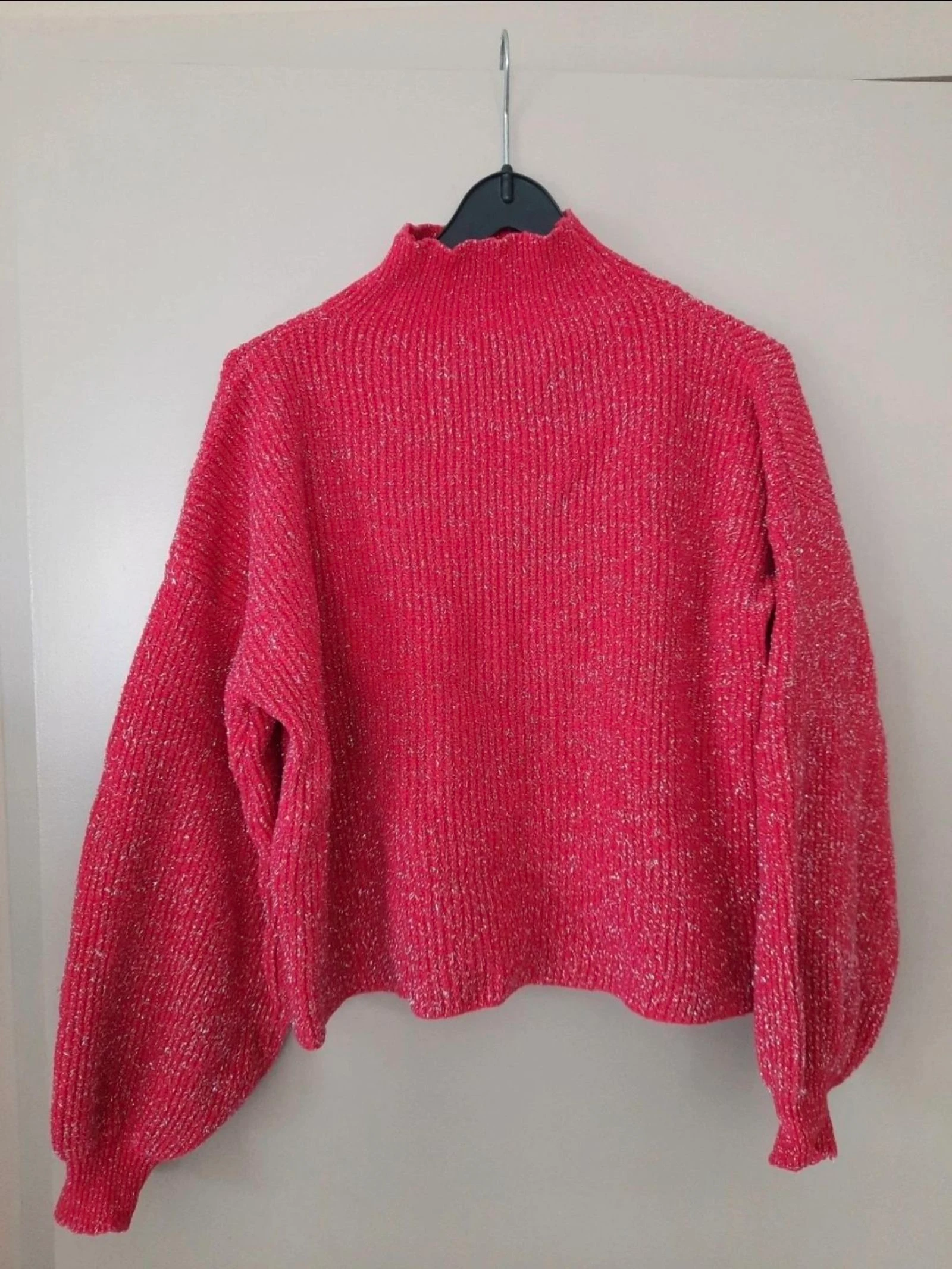 Roze glittertrui met wijde mouwen maat S/M
